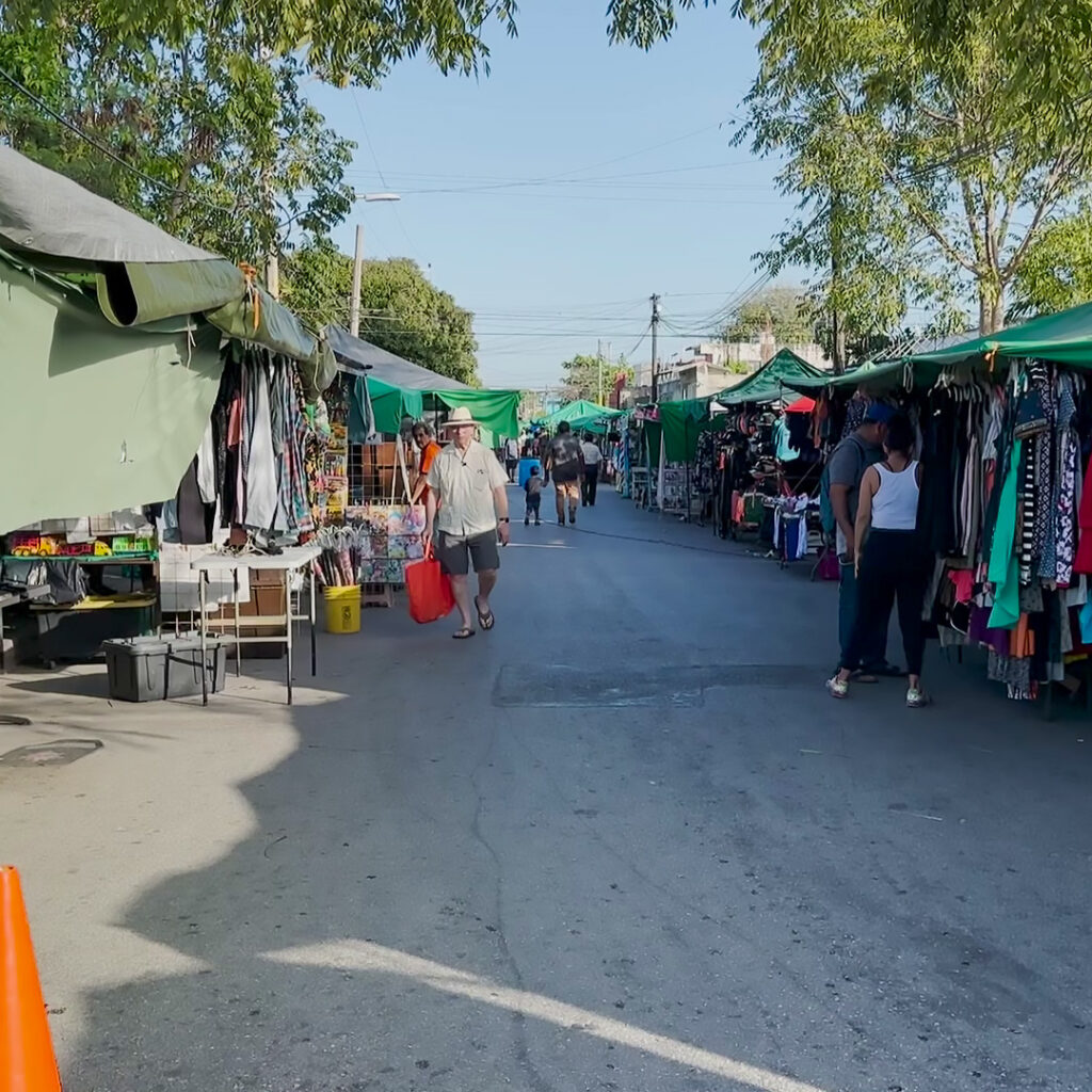 Tiff walking along the Sunday market in Cancun, Mexico