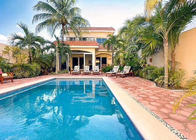 The pool and garden of Casa Zarah in Puerto Morelos.