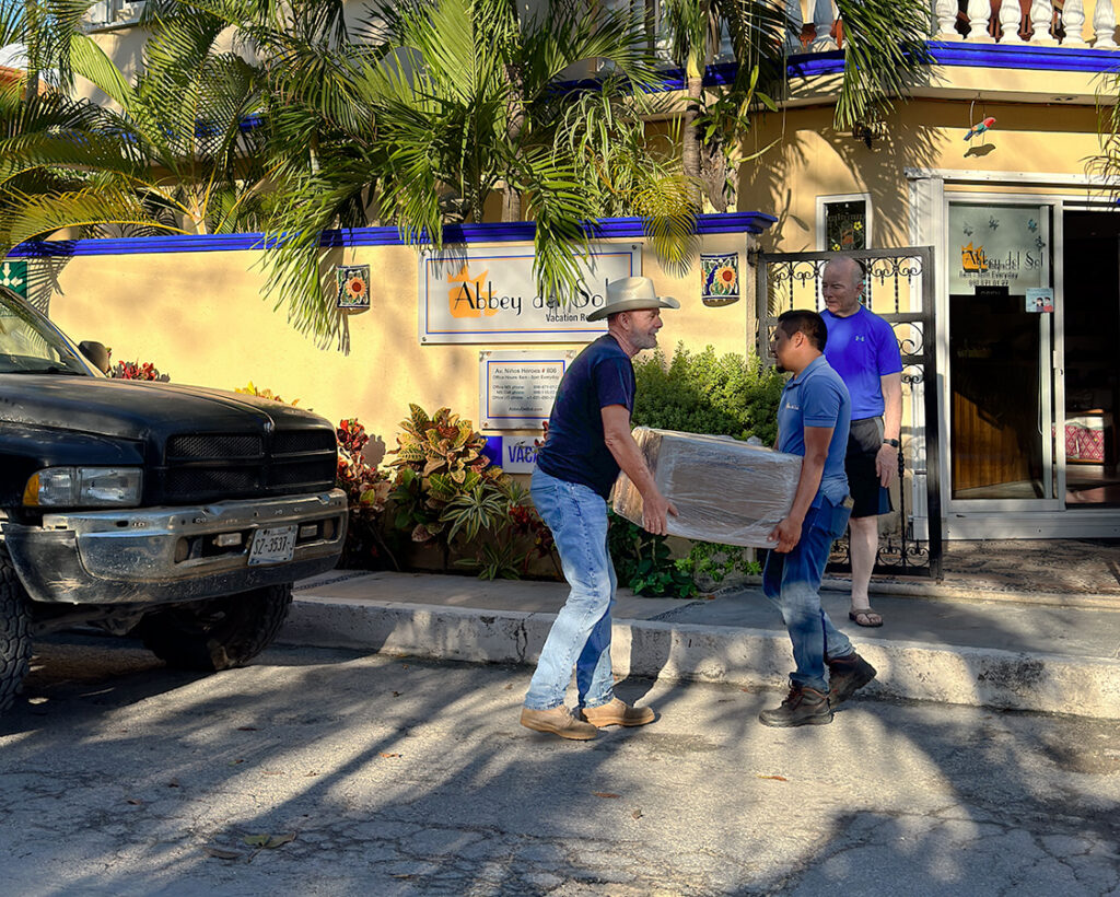 Donating honey jars to the Maya beekeepers