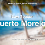 Blurred image of a tropical beach with palm trees and white sand, featuring text that reads: 'Fewer Crowds, More Tranquility - Low Season - Puerto Morelos - A More Authentic Experience.' Ideal for Puerto Morelos vacation rentals.