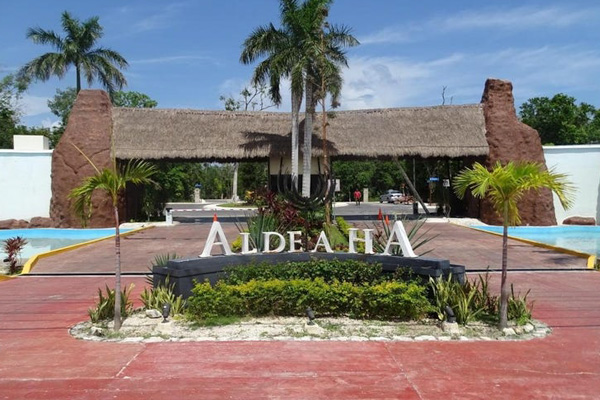 Entrance to Aldea Ha, a gated community offering vacation rentals in Puerto Morelos.