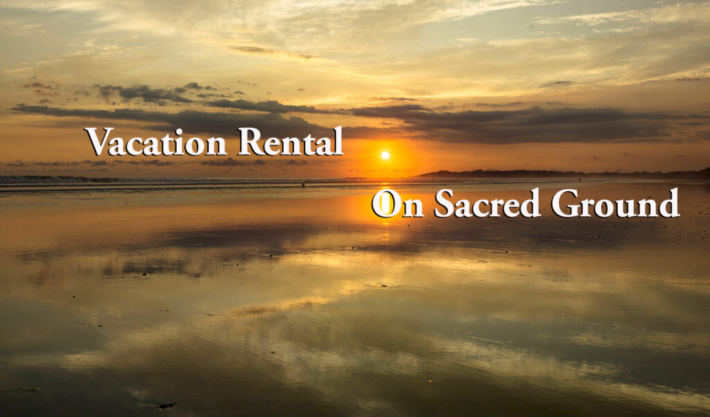 Sunset reflecting on still water with text: “Vacation Rental on Sacred Ground”