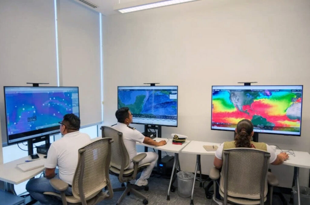 Scientists monitor sargassum movement on screens at the Sargassum Monitoring Centre in Quintana Roo.