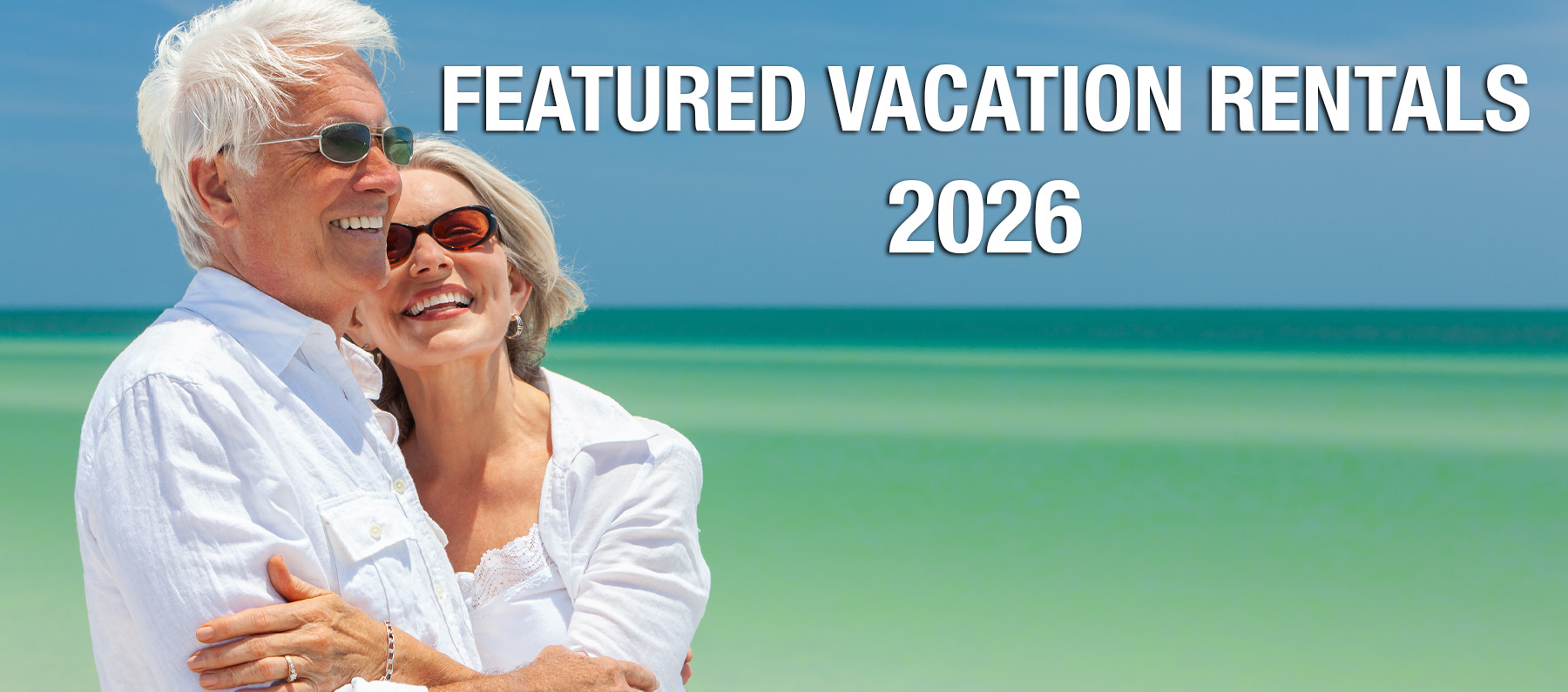 Beach banner for Featured Vacation Rentals of 2026 with smiling couple and turquoise Caribbean water