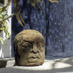 Decorative stone face by the pool at Casa Agua Azul.