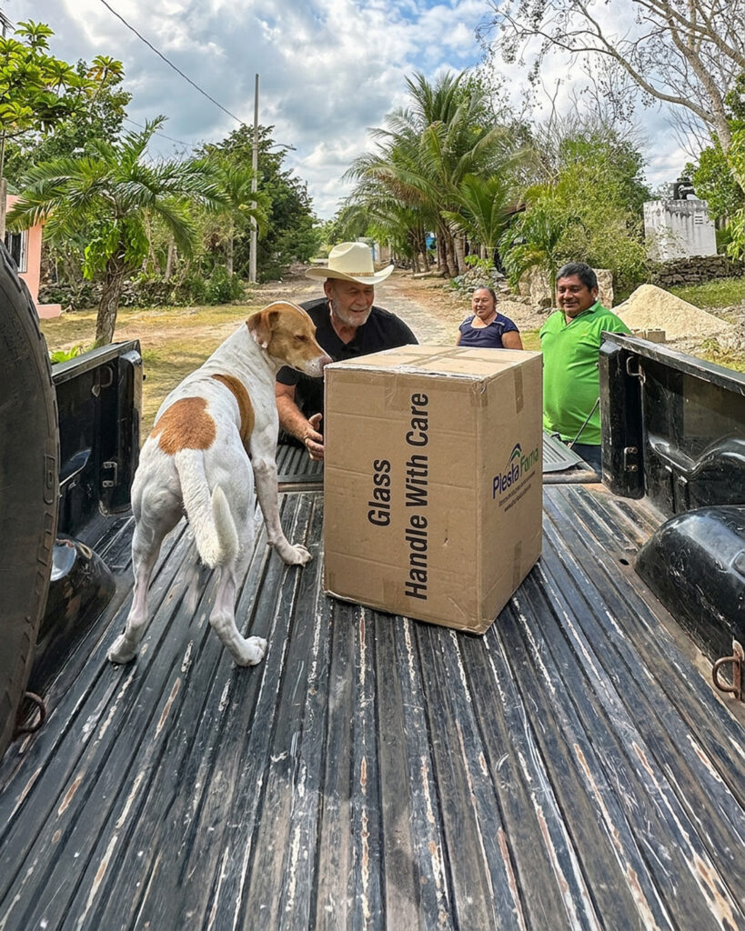 Delivery of glass jars for Maya honey production in the jungle.