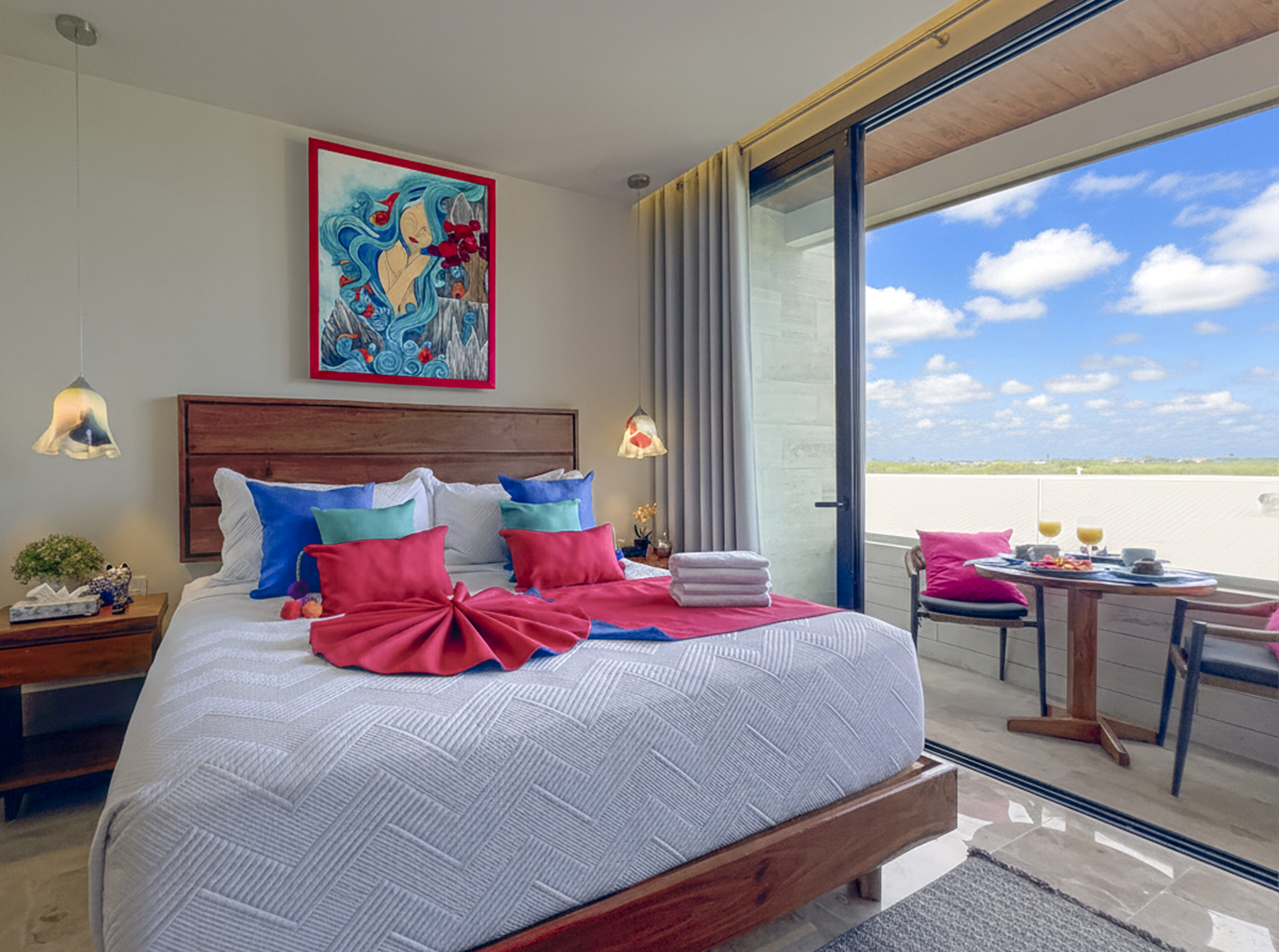 Colorful bedroom opening onto Casa La Aurora’s terrace.
